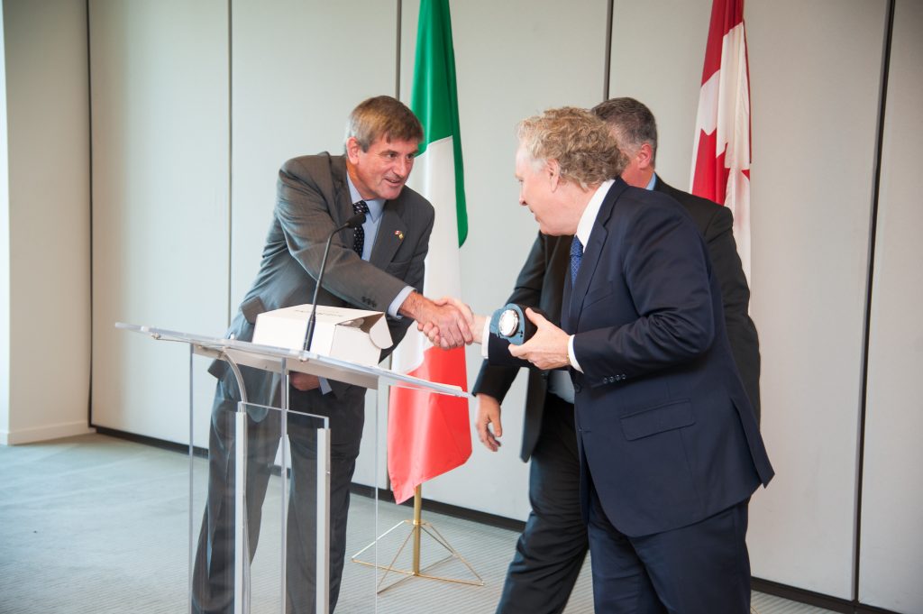 Vivian Doyle-Kelly shaking hands with Quebec Premier Jean Charest